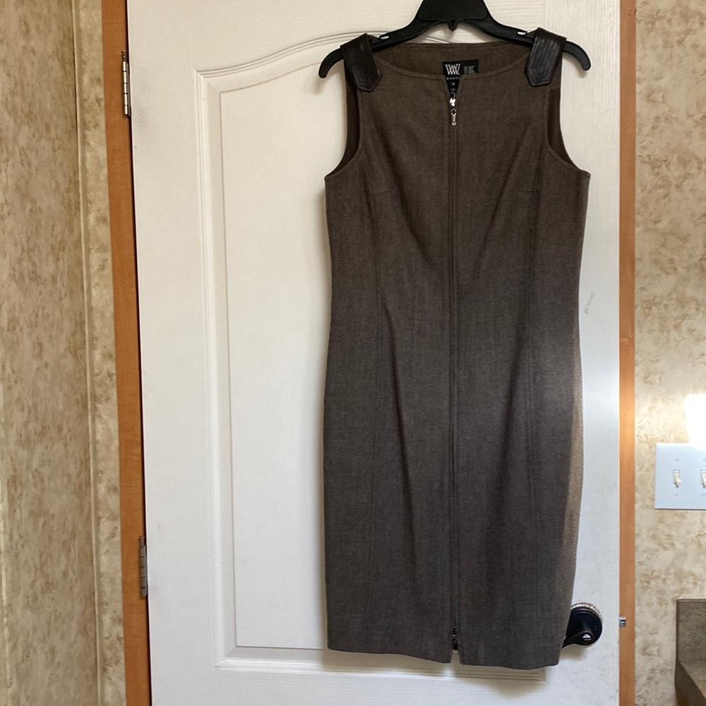 Worth dress. Brown with brown leather on the straps.